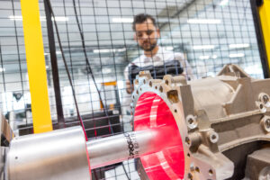 The picture showcases the inspection of metalic surfaces